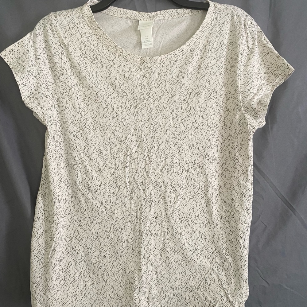 H&M basics top. white with small dots,size medium.